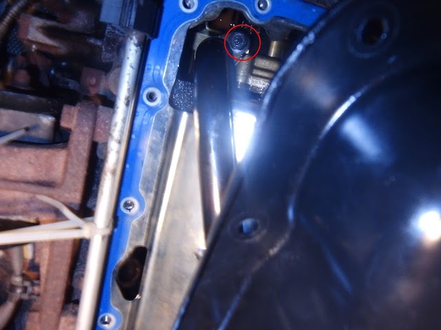 Here you can see the pickup tube bolt